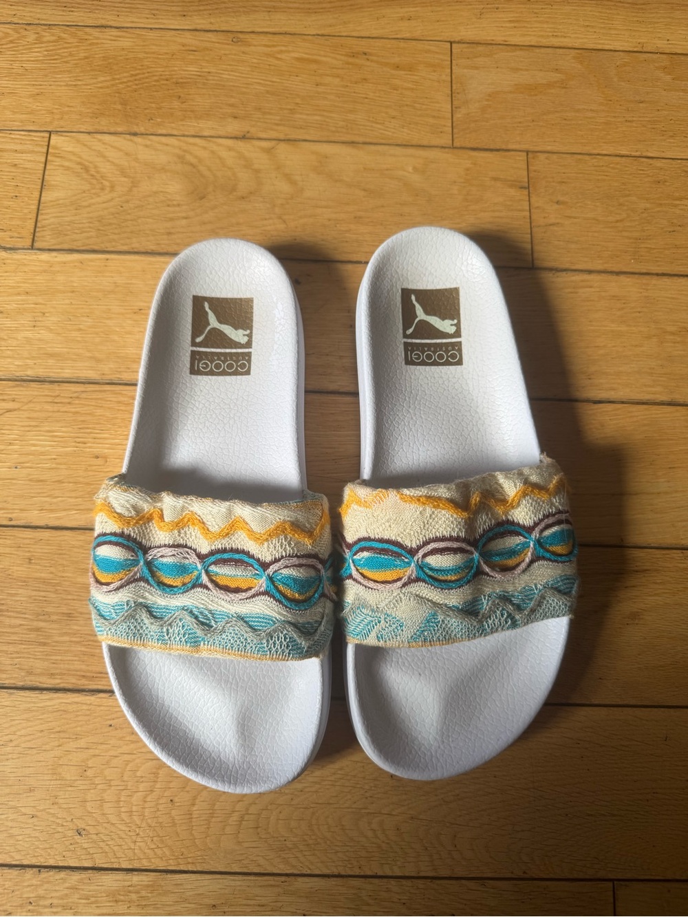COOGI White Slides with Teal, Yellow & Brown Embroidered Straps